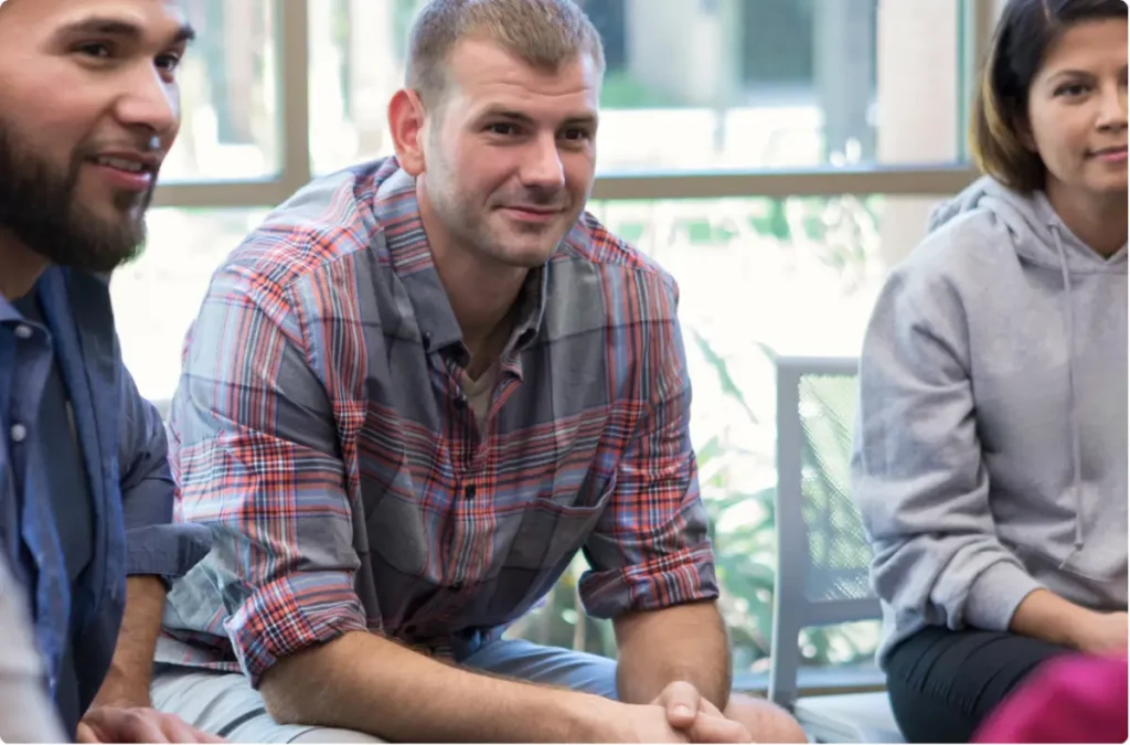 Participants engaged in a group therapy session at an Ohio outpatient and intensive outpatient program.