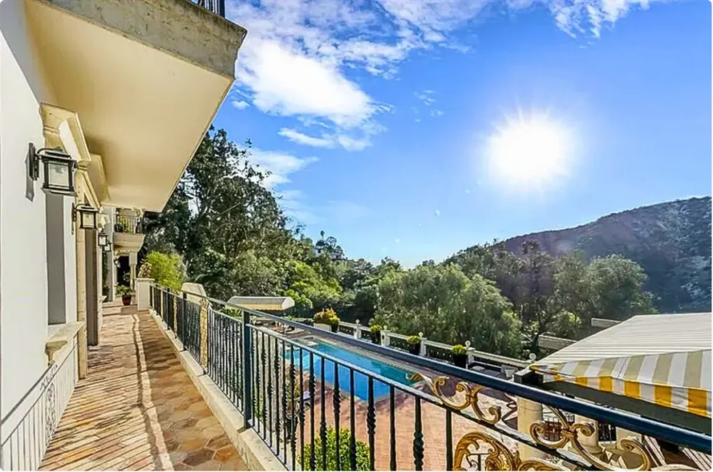 Private balcony view at a luxury residential addiction treatment center in Ohio with pool and peaceful natural surroundings