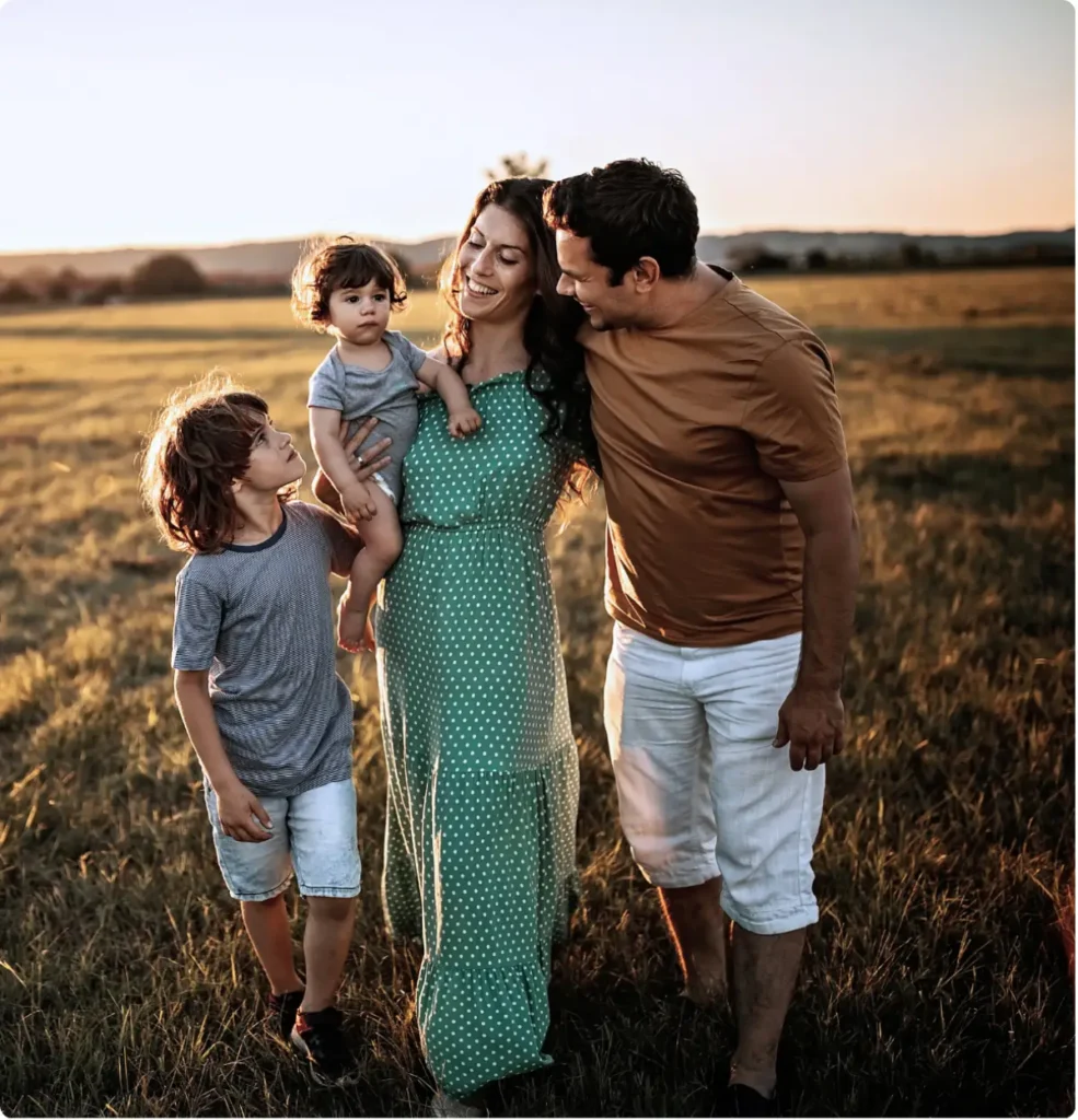 Family enjoying life after PTSD treatment and trauma-informed recovery support.